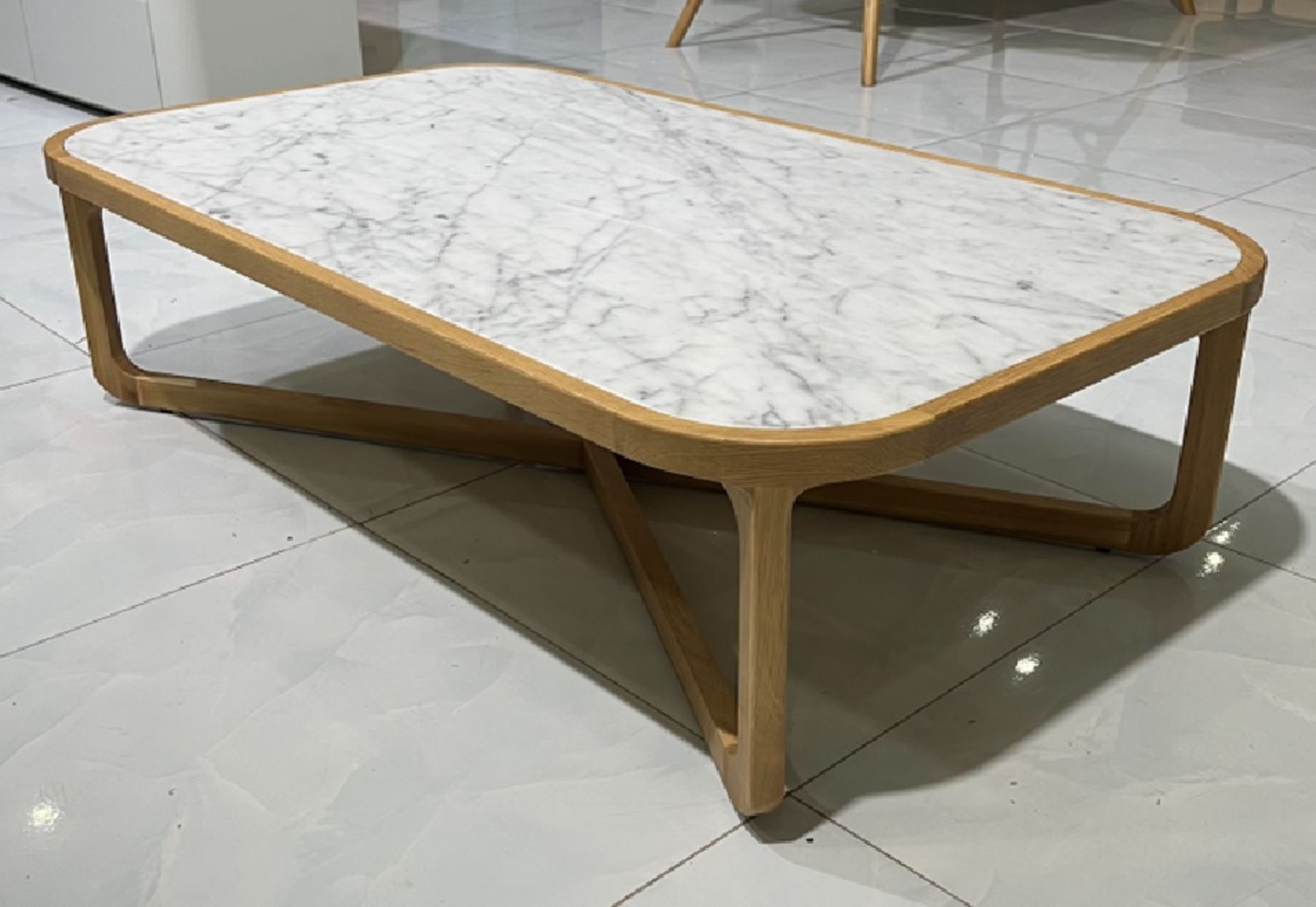 Asher Coffee Table The Asher cocktail table is made of American oak and Italian Carrara marble, with