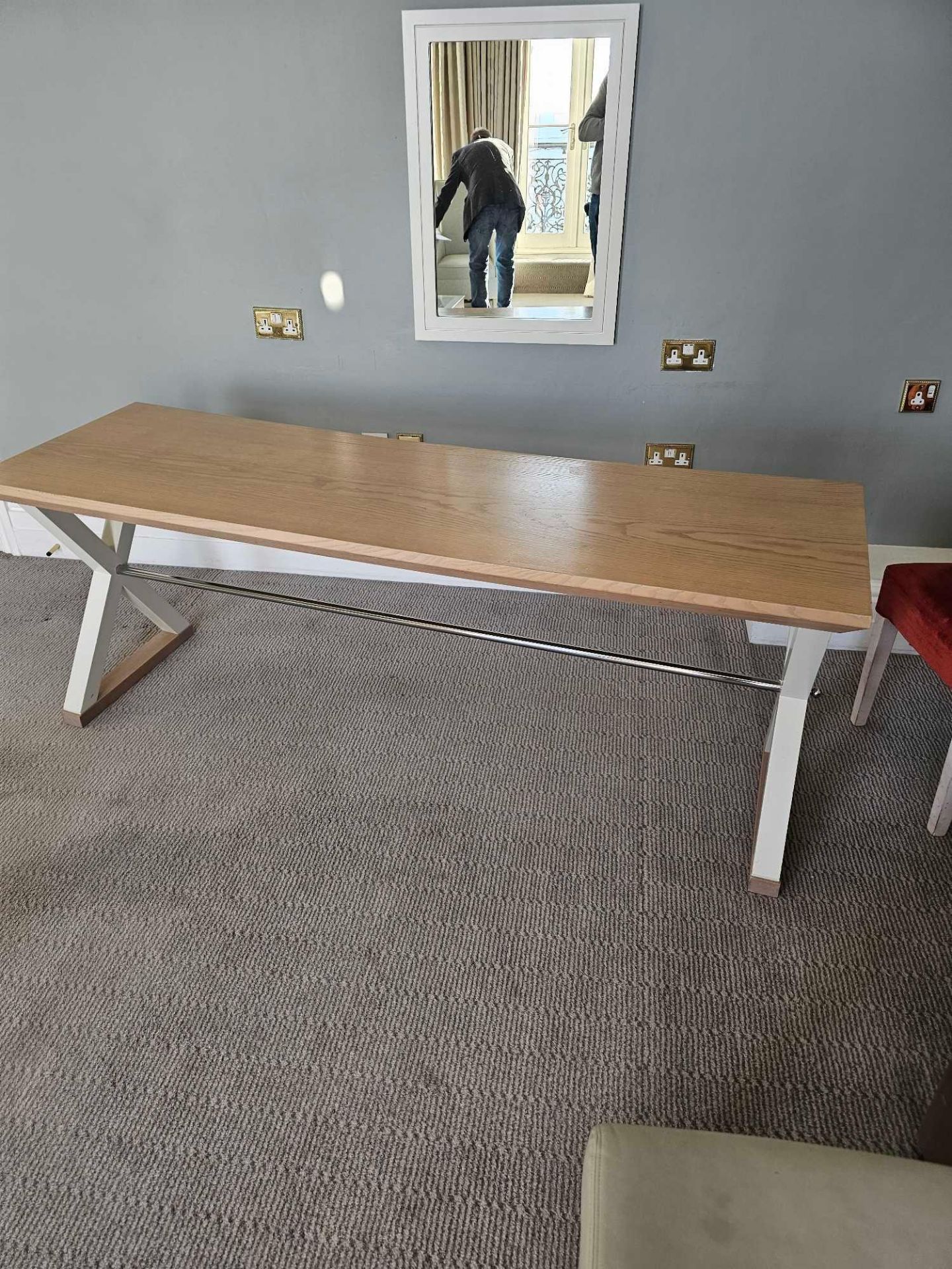 Table Featuring A White Painted Frame, Limed Oak Top, And Chrome Support Stretchers, This Sturdy