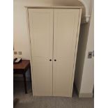 A Contemporary Two Door Wardrobe Gardenia White Finish Internally Fitted With Shelving And Chrome