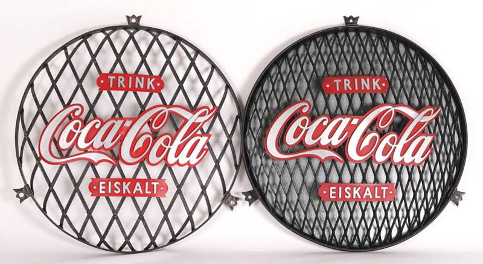 Two grid signs Coca-Cola