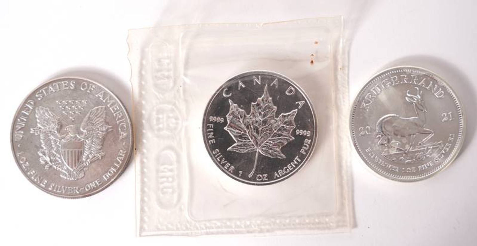 Three silver coins