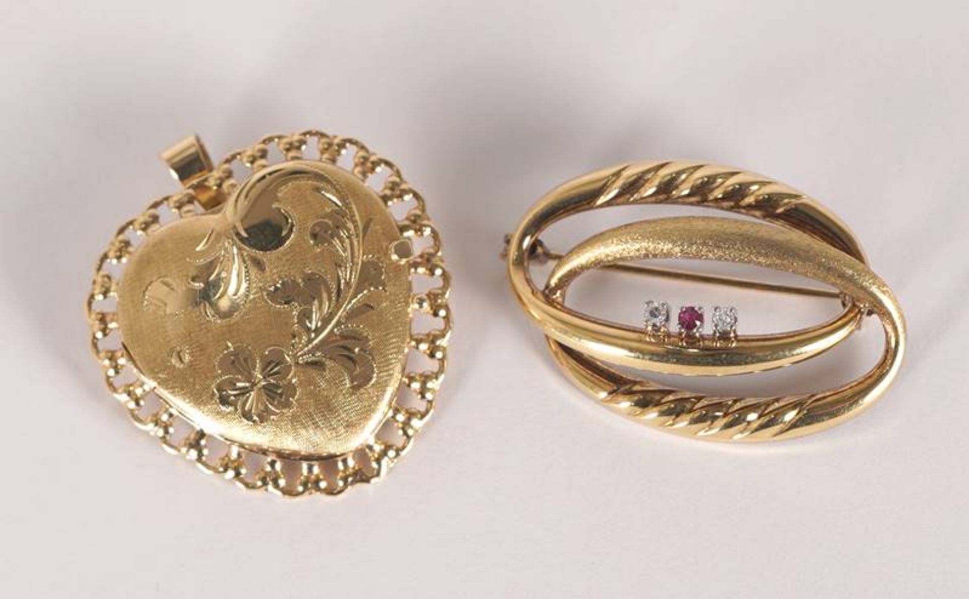 Two gold brooches