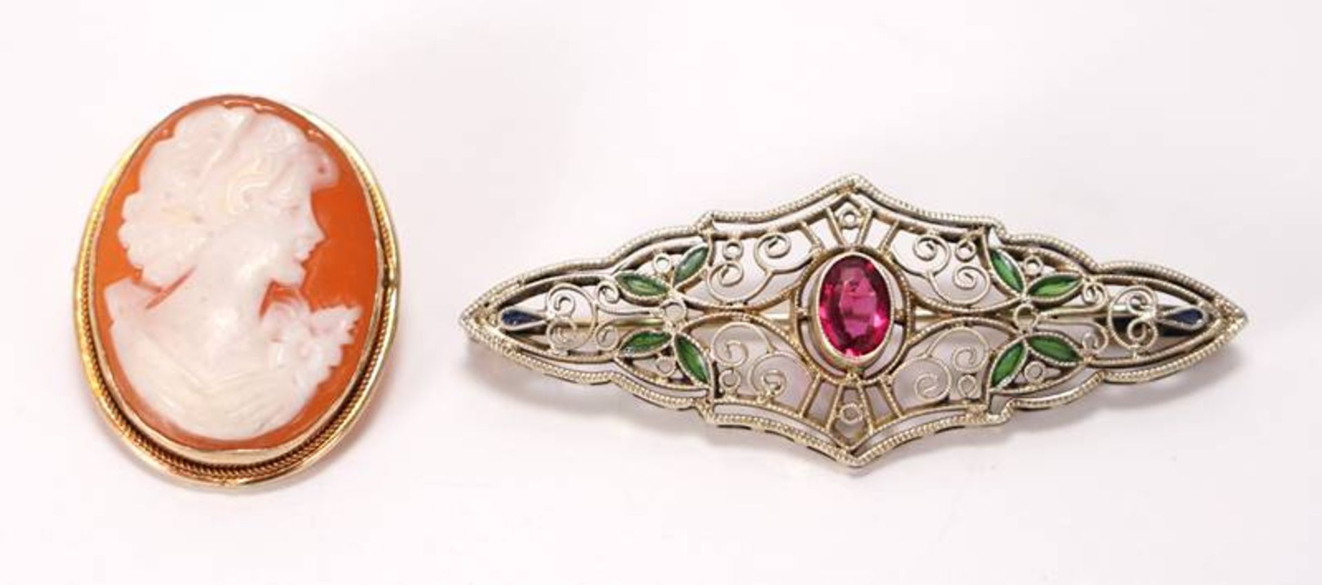 Two brooches