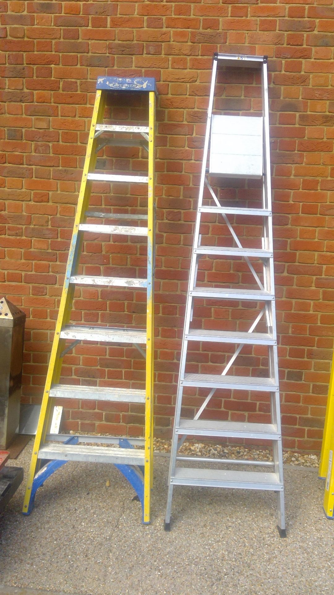 Werner 7-step step ladder and a Youngman 7-step ladder