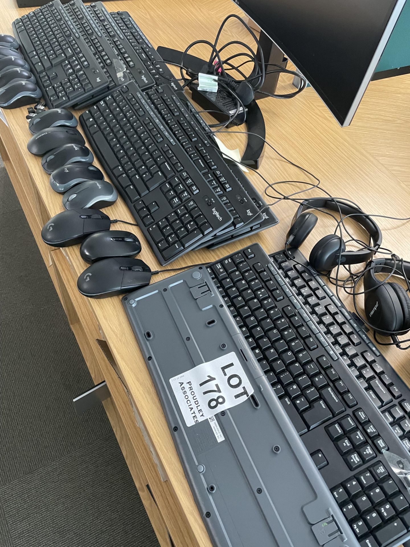 11 x Logitech wireless keyboards, 11 x wireless mice, 3 x USB headphones plus 2 x Logitech cable –