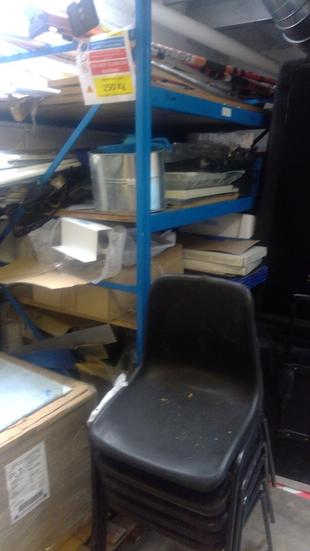 Remaining contents of left hand end of store (exclusing racking), to include stacking chairs,