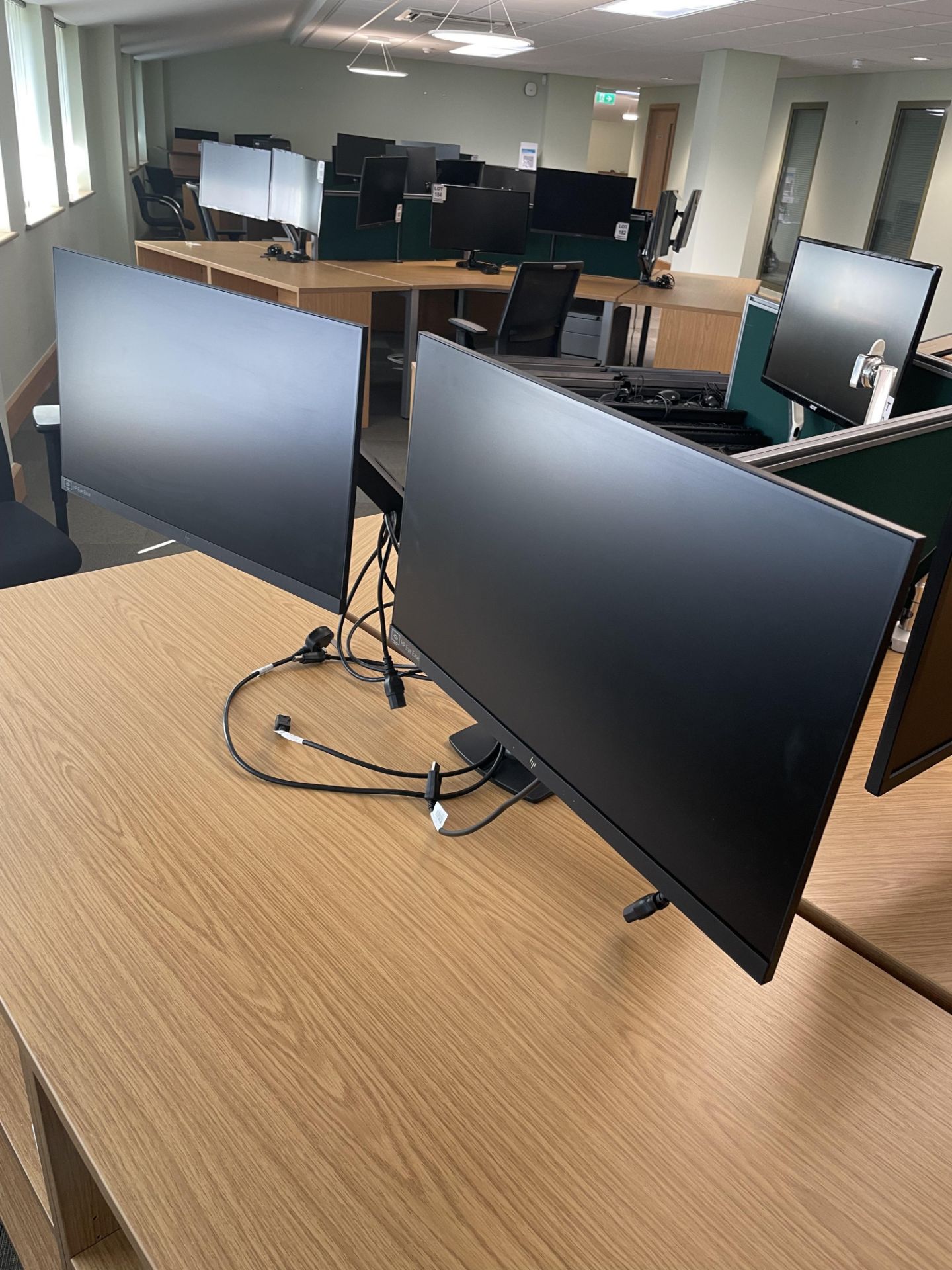 2 x HP 24" screens with twin arm desk stand