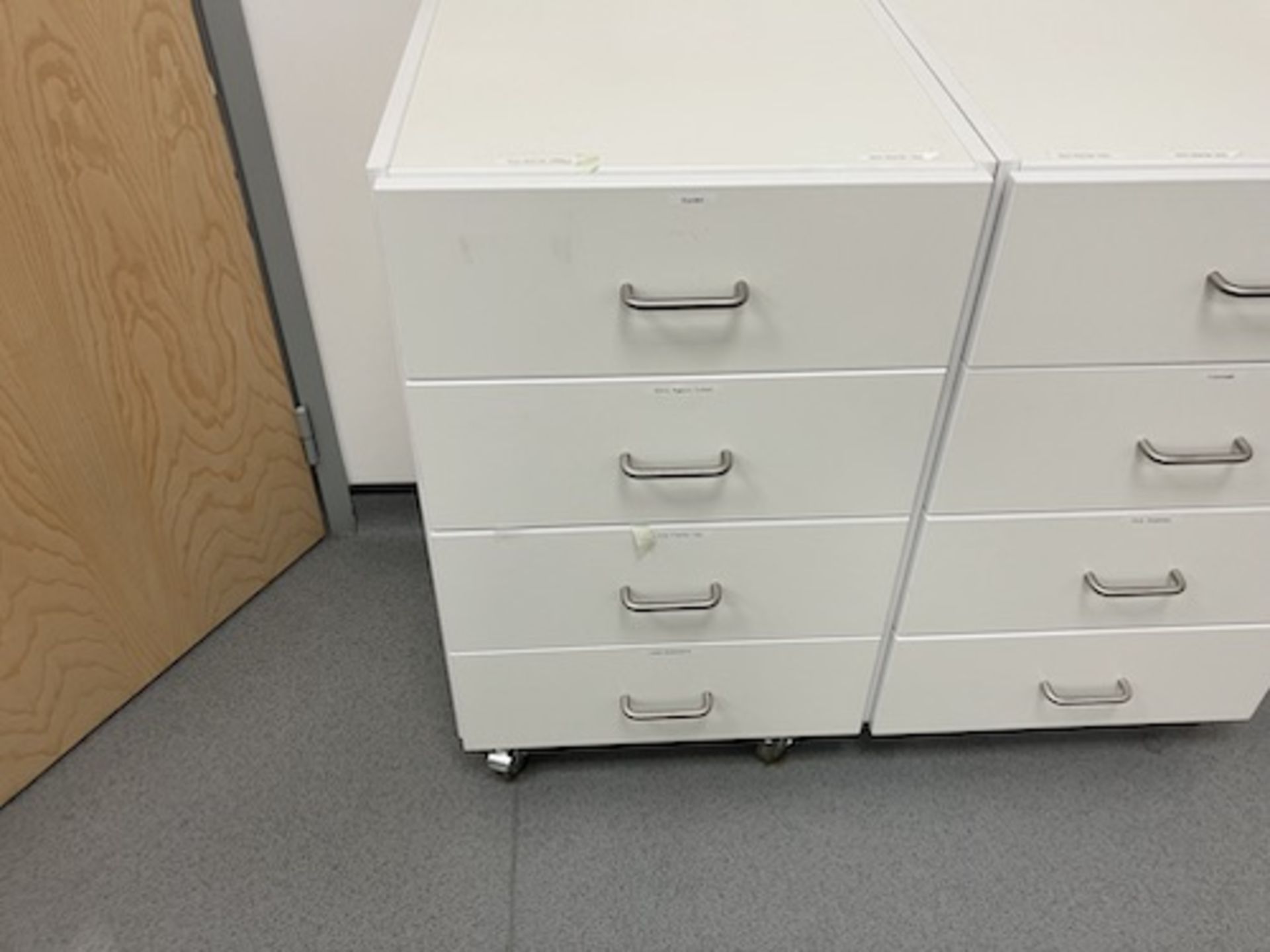 Mobile four drawer chest and contents As lotted