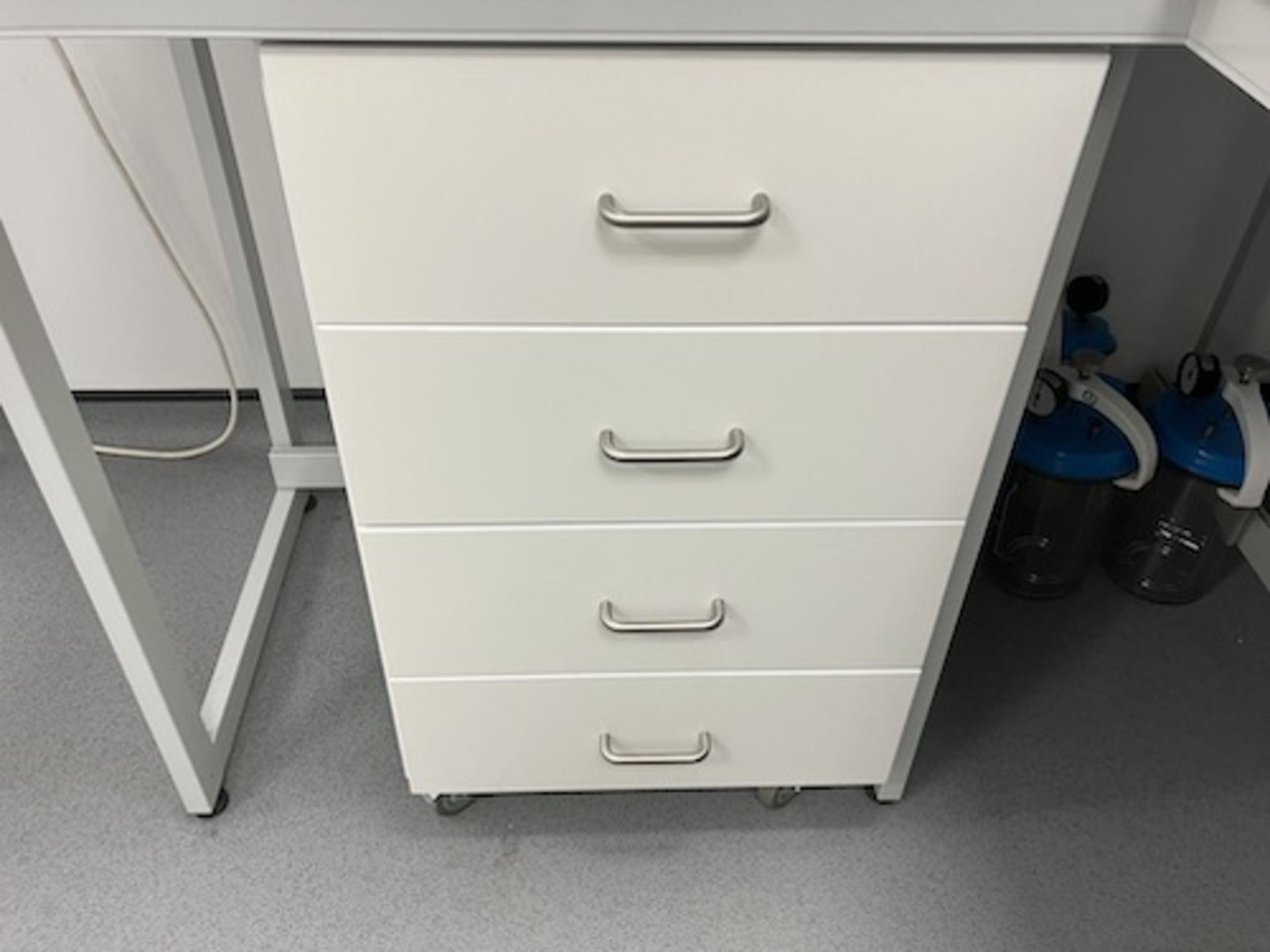 Mobile four drawer chest and contents As lotted