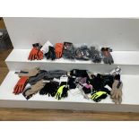 A quantity of cycling gloves, as lotted