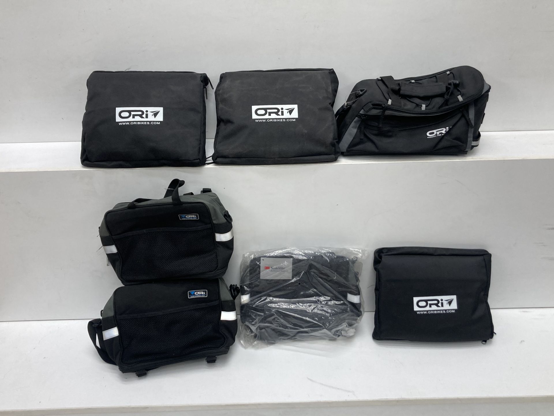 6 x Ori Bikes covers and carry bags, as lotted