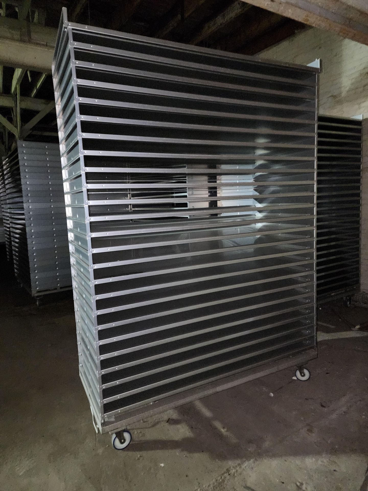 Stack of (25) Aluminum Trays, non-perforated, on Transport cart