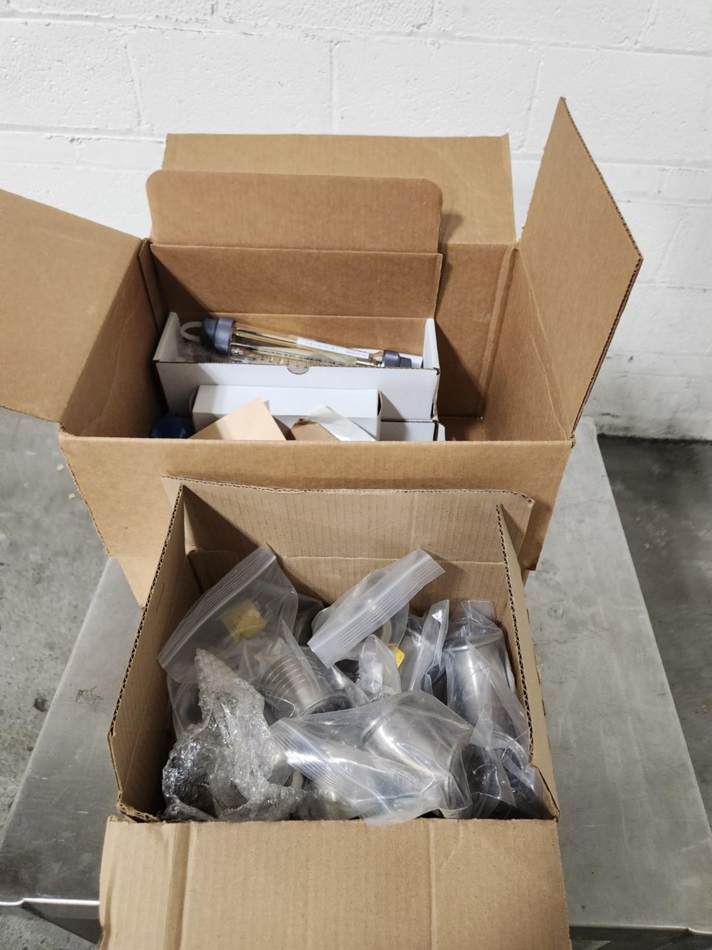 Lot of stainless steel components and small valves, and other assorted parts. {TAG: 1180129}