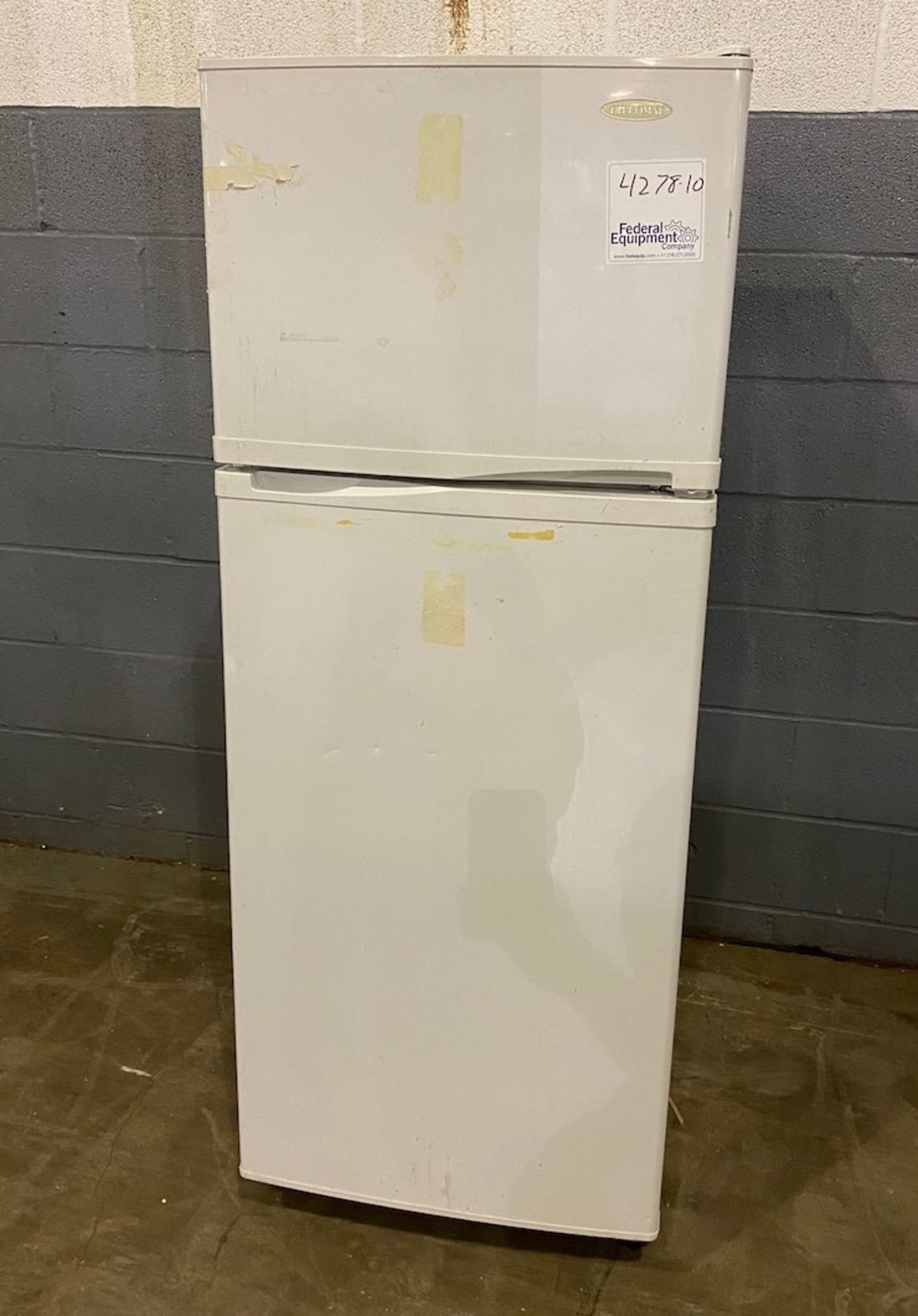 Danby refrigerator and freezer unit, model DFF8803W, made in 2005, S/N DH900742. {TAG: 1180054}
