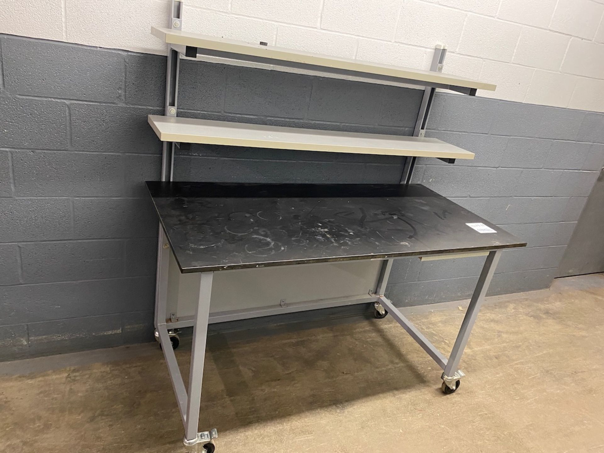 Lab bench, on casters, 60" x 30" bench top. {TAG: 1180062}