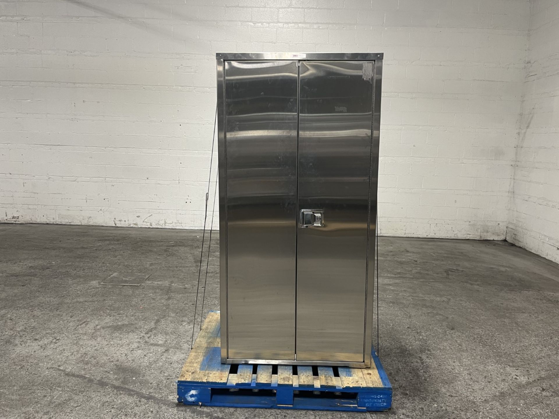 Stainless steel cabinet. 22" x 48" x 67" {TAG: 1180114}