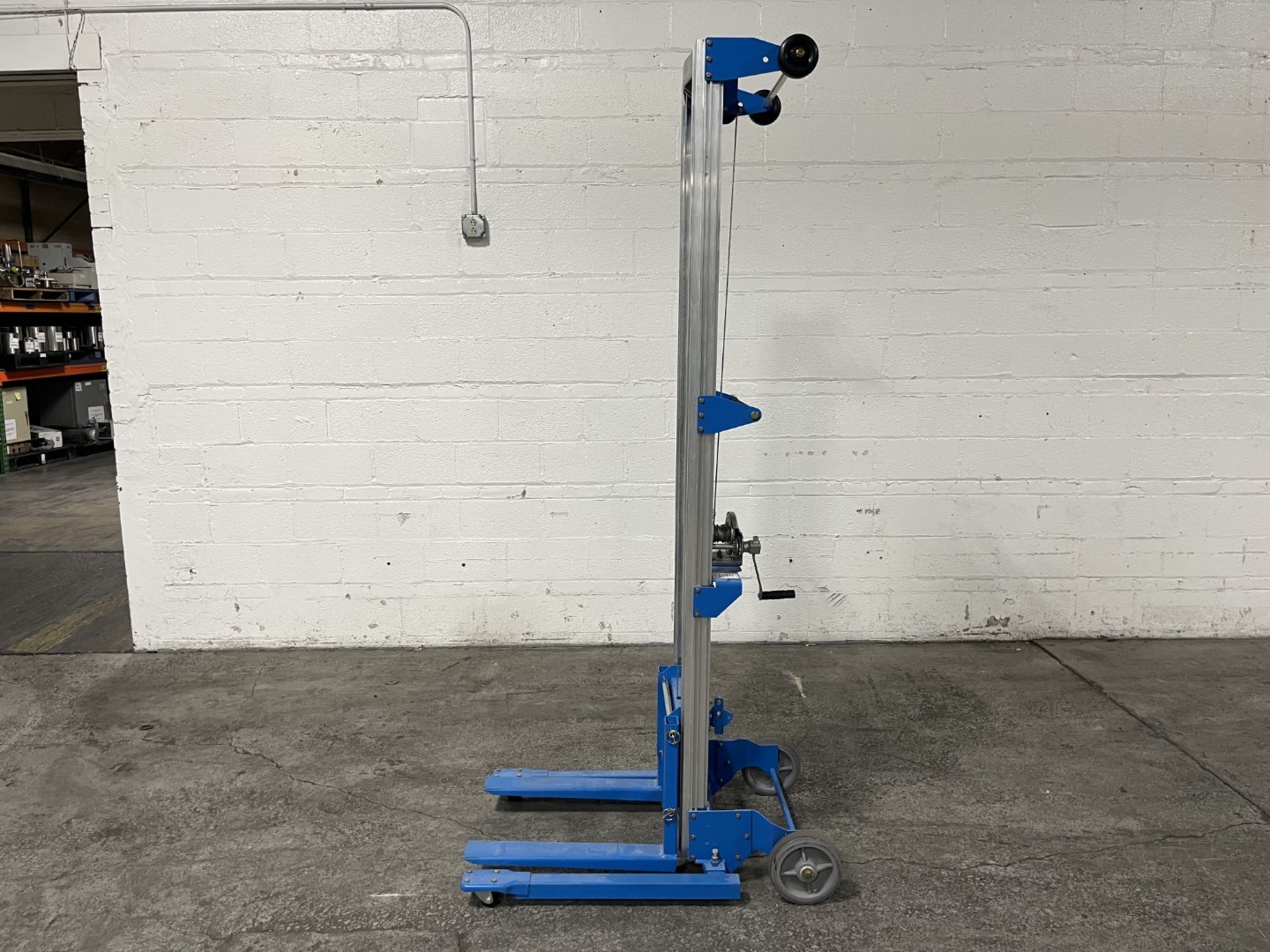 Genie lift, model GL-12, 350 lbs. capacity, approximately 66" max lift, with forks, serial# GL10- - Image 4 of 5