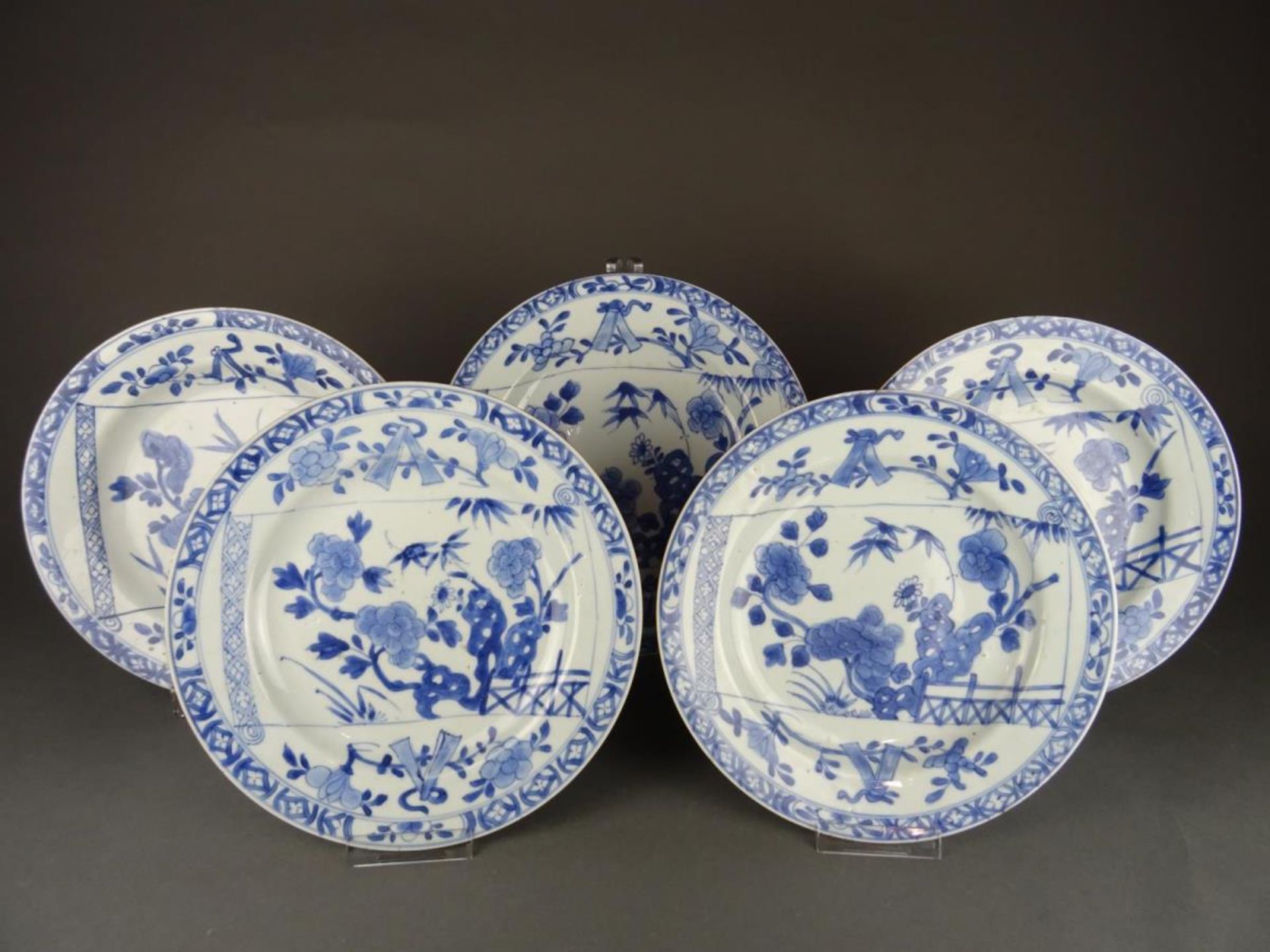 Five porcelain B/W plates