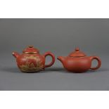Two Yixing teapots