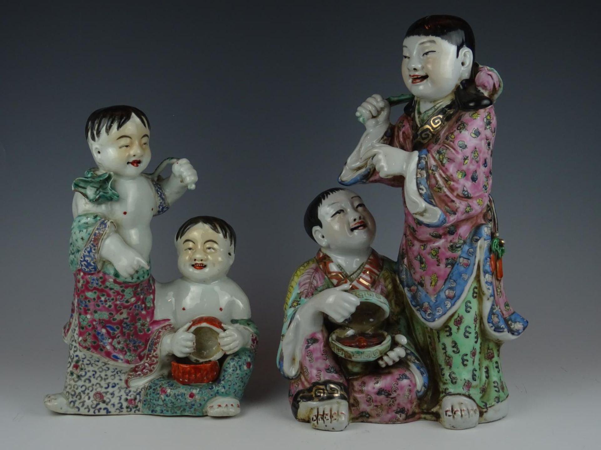 Two porcelain statues