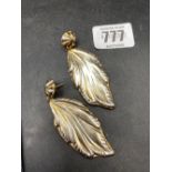 A LARGE PAIR OF SILVER LEAF SHAPED EAR PENDANTS