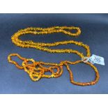 2 LONG AMBER STYLE NECKLACES