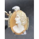 A CARVED CAMEO SHELL PENDANT WITH MARCASITE