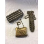 WHITE METAL CHEROOT HOLDER, BRASS SPECTACLE HOLDER ON CHAIN & A BRASS EMBOSSED/ ENGRAVED PURSE,