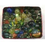 TIN OF MARBLES