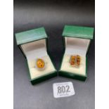 2 BOXED SILVER & AMBER RINGS