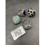 4 SILVER DRESS RINGS