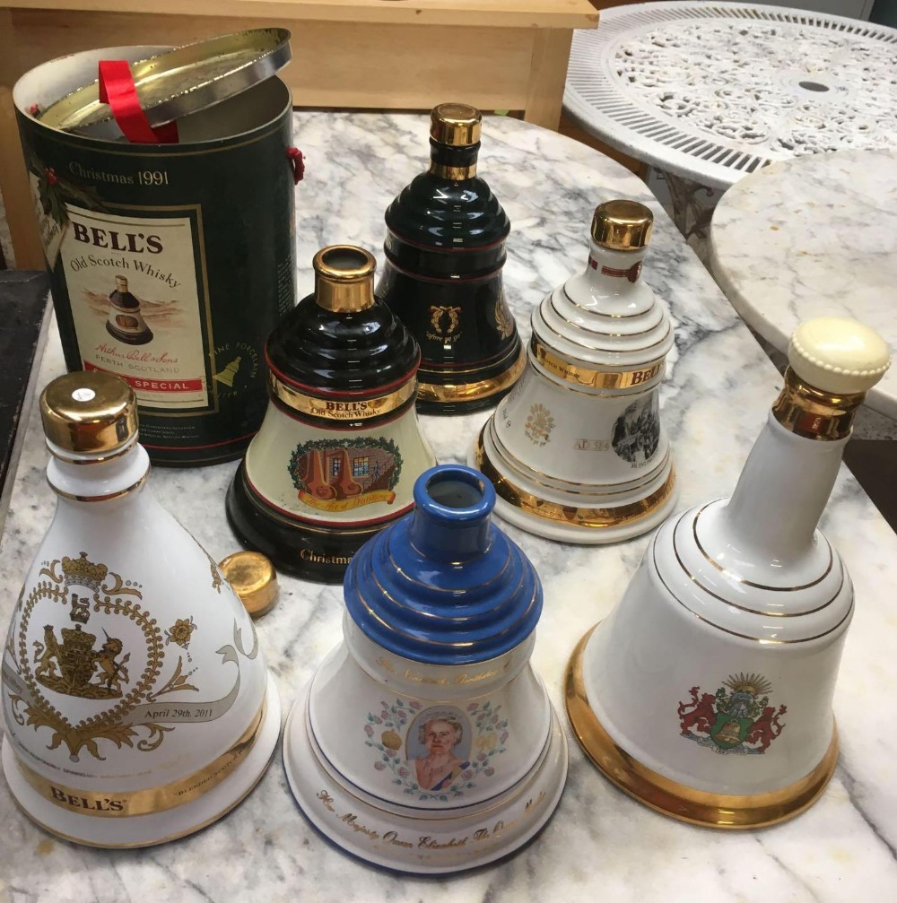 6 PORCELAIN WHISKY DECANTERS,