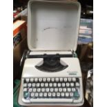 CASED TYPEWRITER OLYMPIA 33