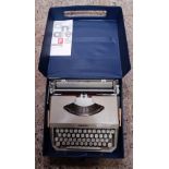 ANTARES PORTABLE TYPEWRITER IN BLUE CASE