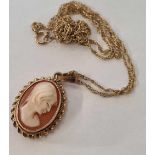 A 9ct CARVED CAMEO PENDANT ON 9ct FINE NECK CHAIN