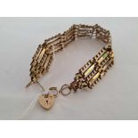 A 9ct 5 BAR GATE BRACELET WITH HEART PADLOCK, 9.