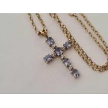 A 9ct MOUNTED CROSS ON 9ct NECK CHAIN