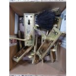 SMALL CARTON OF MISC BRASS DOOR HANDLES & A BRUSH