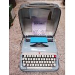 CASED BROTHER DELUXE PORTABLE TYPEWRITER