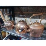 SHELF WITH 3 COPPER KETTLES & A COPPER WARMING STAND WITH BURNER & KETTLE
