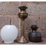 BRASS DOUBLE BURNER OIL LAMP WITH WHITE GLOBE, A COPPER BURNER OIL LAMP,