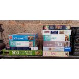 SHELF OF MISC JIGSAW PUZZLES