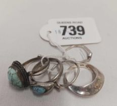 SIX SILVER MOUNTED RINGS