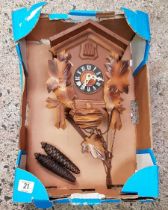 CARTON WITH A BLACK FOREST CUCKOO CLOCK