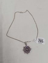 A SILVER & AMETHYST COLOURED PENDANT ON CHAIN