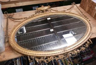 OVAL GILT FRENCH DESIGN MIRROR - IN NEED OF RESTORATION