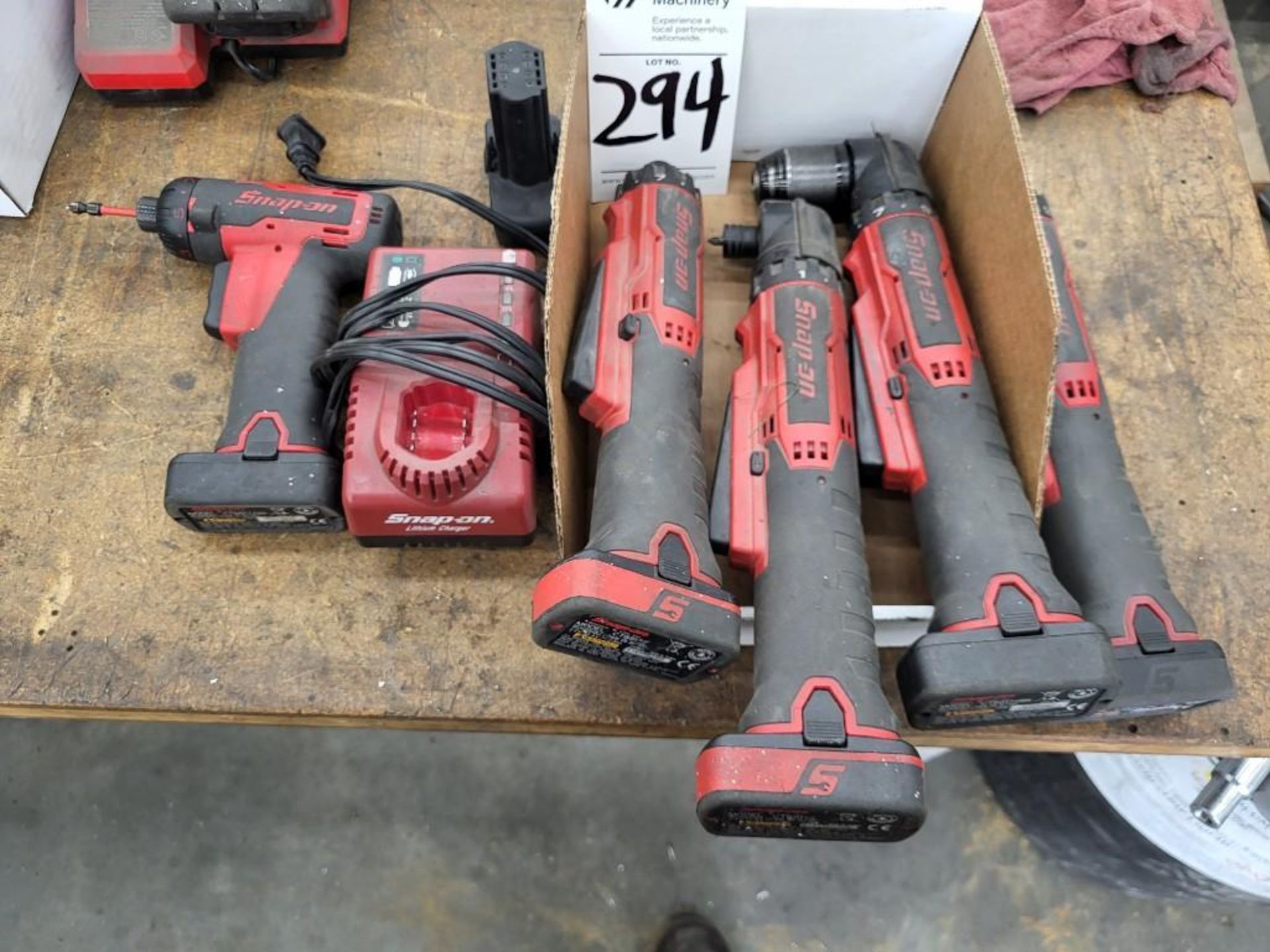 LOT OF SNAP-ON CORDLESS DRILLS AND DRIVERS. WITH CHARGER AND BATTERIES