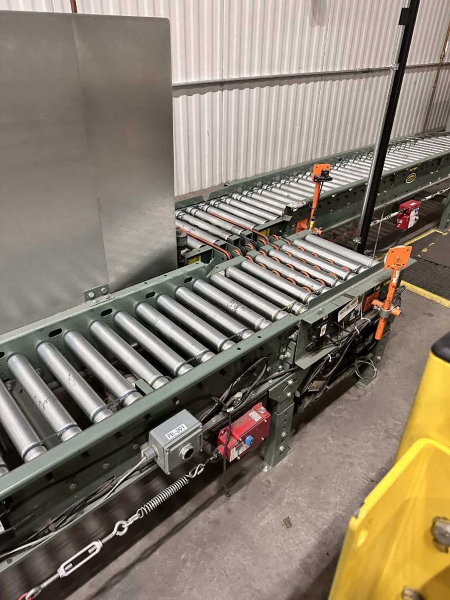 HYTROL POWER CONVEYOR SYSTEM 57 FOOT LONG DRIVEN. WITH BOX SHIFTER