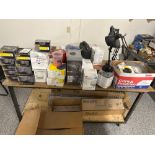 ROLLING TABLE FULL OF MISC. ITEMS : FLUORESCENT LIGHTS, DESK LAMPS, PADS, MASKS, HAND TOOLS