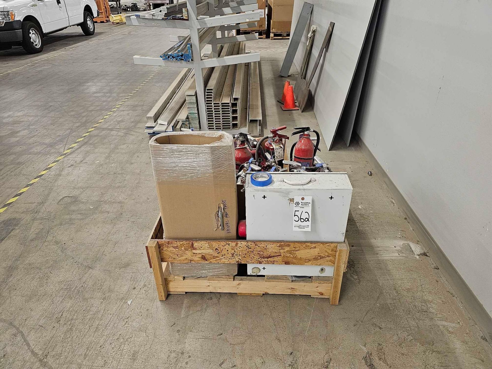 PALLET OF FIRE EXTINGUISHERS AND FIRST AID CABINET